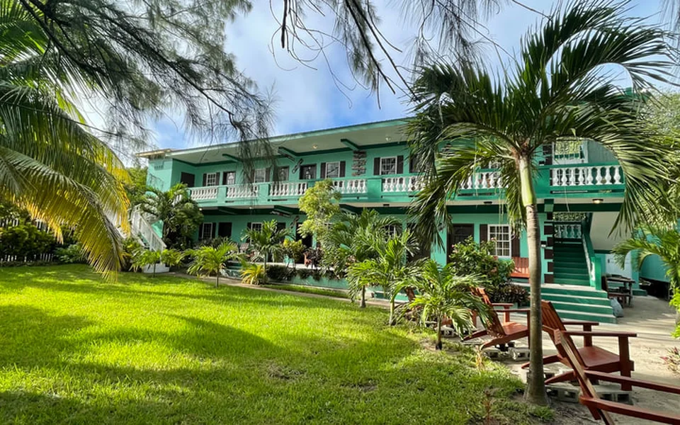 Tropical exterior and gardens at Belize Budget Suites